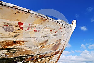 Rusty prow on the beach photo