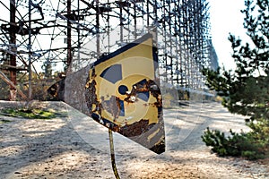 Rusty radioactivity warning sign in the Chernobyl exclusion zone