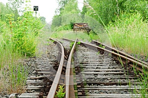 Rusty railway switch with lost train