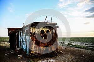 Rusty remains of a fishing ship photo