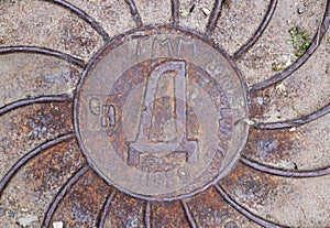 Rusty Road Hatch. Iron Manhole Urban Art