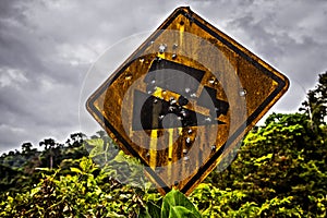 Rusty road sign - cool descent in holes from bullets.