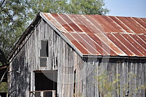 Rusty Roof Old wood barn in Adamsville Texas