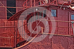 Rusty rugged ship in indonesia harbor