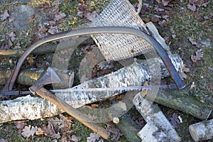 Rusty saw and axe