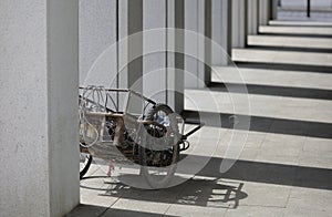 A scrap trolley standing in a richer district of WrocÃâaw photo
