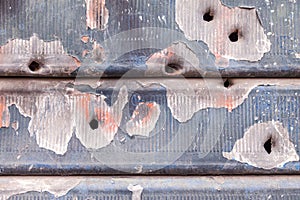Rusty and scratched metal panel background
