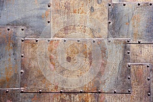 Rusty and scratched metal panel background