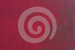 Rusty and scratched red metal panel background