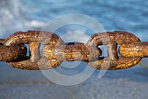 Rusty sea chain close-up