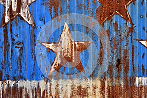 Rusty Sheet Metal With Red, White, and Blue Paint