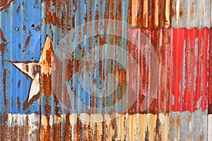 Rusty Sheet Metal With Red, White, and Blue Paint