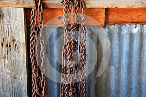 Rusty sheets and metal chains