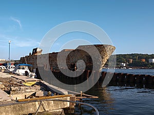 Rusty ship on the pier Vladivostok sity Russia.