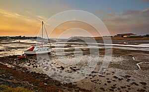 Rusty shipwreck at the beach of the Walney Channel in Roa Island, Cumbria, England, UK