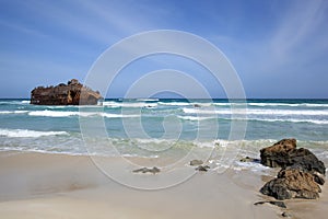 Rusty shipwreck and a blue Atlantic Ocean on Boa Vista