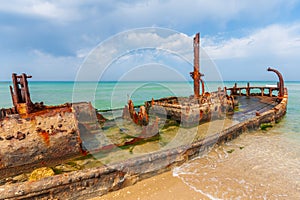 Rusty shipwreck on Habonim shore, Israel