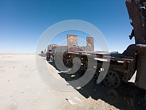 Rusty steam locomotive near Uyuni in Bolivia. Cemetery trains
