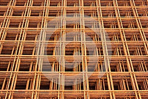 Rusty steel rebar grids, abstract construction backround