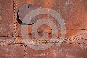 Rusty steel with rivets