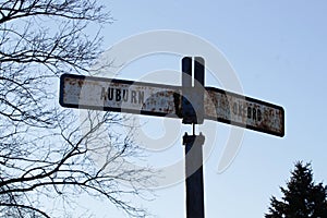 rusty still standing, legible town line sign for AUburn Oxford