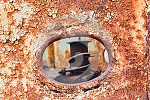 Rusty submarine armoured porthole or window metal background.