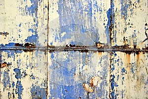 Rusty surface background. Corroded metal background. Rusted blue painted metal wall