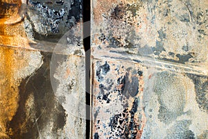 Rusty surface of the burnt car doors