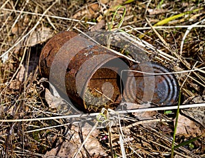 Rusty tin can in the woods