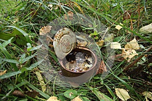 rusty tin can in the woods