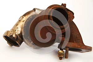 Rusty used dirty unmounted turbocharger on background checking for overhaul