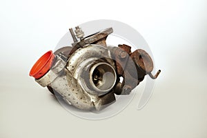 Rusty used dirty unmounted turbocharger on background checking for overhaul