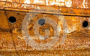 Rusty wall of an abandoned ship