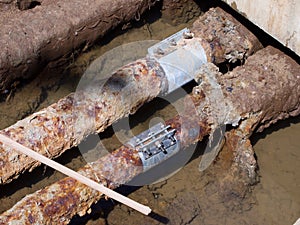 Rusty water pipes with embedded holes