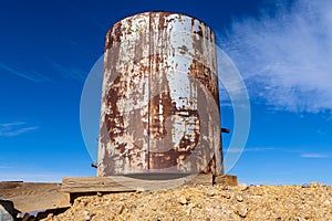 Rusty water tank abandoned in the Nevada desert