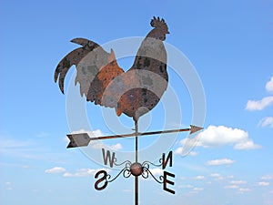 Rusty weathercock photo