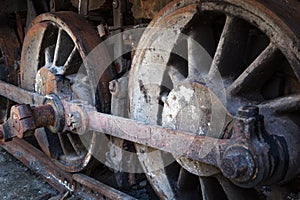 Rusty wheels of old steam locomotive