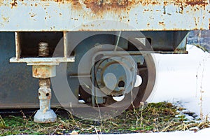 Rusty wheels of old steam train