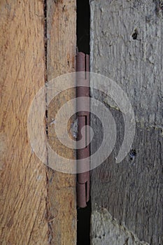 Rusty wooden door hinges