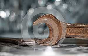 Rusty wrenches on a beautiful bokeh background