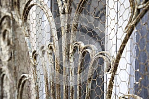 Rusty wrought iron fence construction