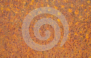 Rusty yellow metal surface. Saturated orange, red, grunge rusty metal texture background. photo