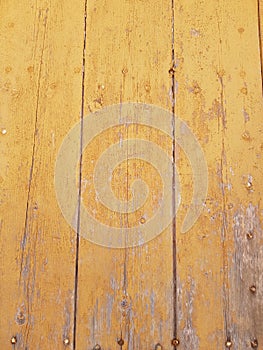 Rusty yellow mustard wood door photo