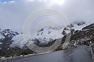 Ruta 107 on the way to Tunel Punta Olimpica with Cordillera Blanca snow capped mountain range in the background. Location: East-