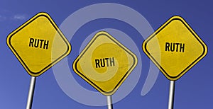 Ruth - three yellow signs with blue sky background