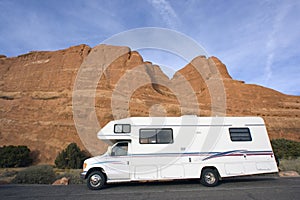 RV against red rock formation