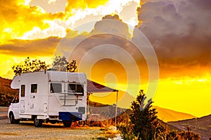 Rv camper in mountains at sunset, France