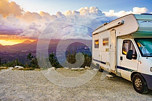 Rv camper in mountains at sunset, France