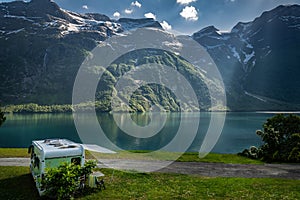 RV Camper Van Camping Next to Scenic Lovatnet Lake in Norway