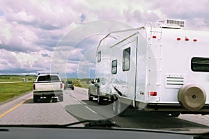 RV and cars on road